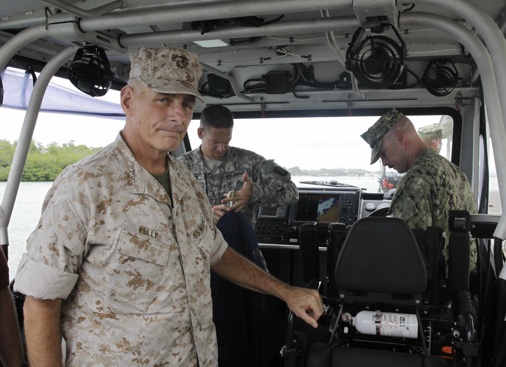 Marine Gen. John F. Kelly, commander of U.S. Southern Command, arrives at the U.S. Navy base in Guantanamo Bay, Cuba, which he oversees, on Saturday amid an outcry in Washington over the exchange of five Taliban prisoners who were held at Guantanamo for a captured U.S. soldier. The Associated Press 