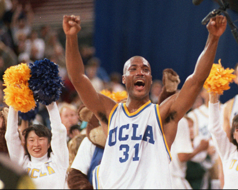 In this April 1995 file photo, UCLA’s Ed O’Bannon celebrates after his team won the NCAA championship game against Arkansas in Seattle. Five years after the former UCLA star filed his antitrust lawsuit against the NCAA, it went to trial Monday, June 9, 2014. The Associated Press/Eric Draper