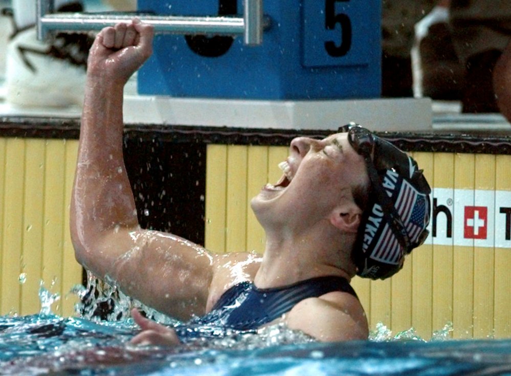 In this July 26, 1996 file photo, Amy Van Dyken of the United States celebrates after winning the gold medal in the women's 50 meter freestyle at the 1996 Summer Olympic Games in Atlanta. The Associated Press/David Longstreath