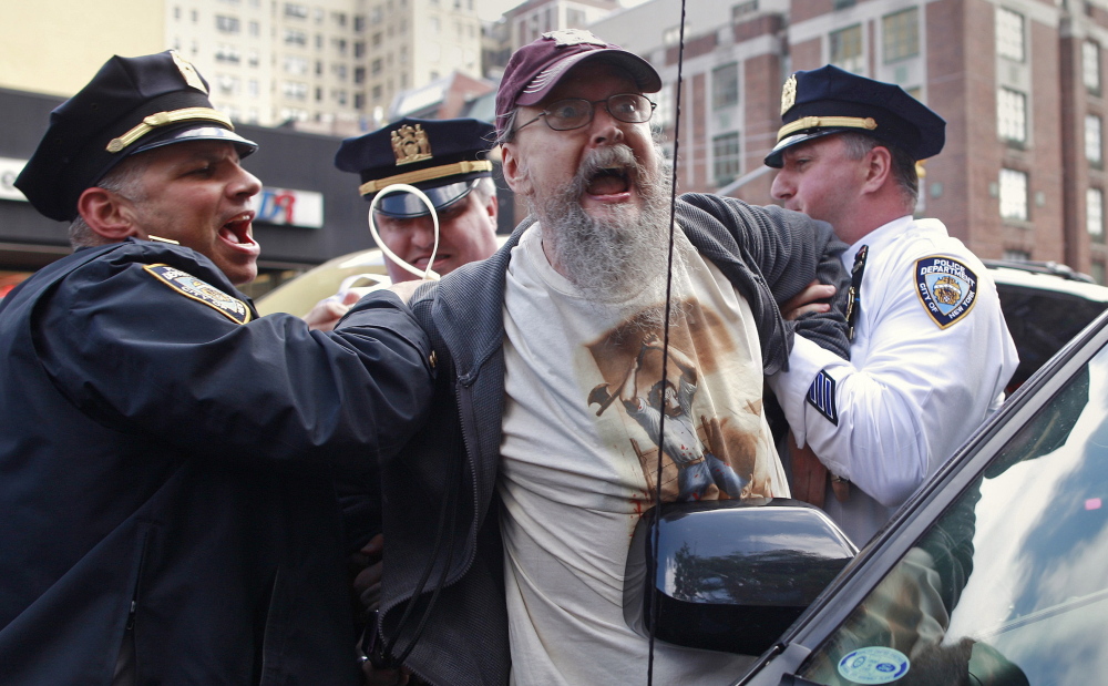 An Occupy Wall Street activist is arrested by New York City police during a May 1, 2012, demonstration. Reuters