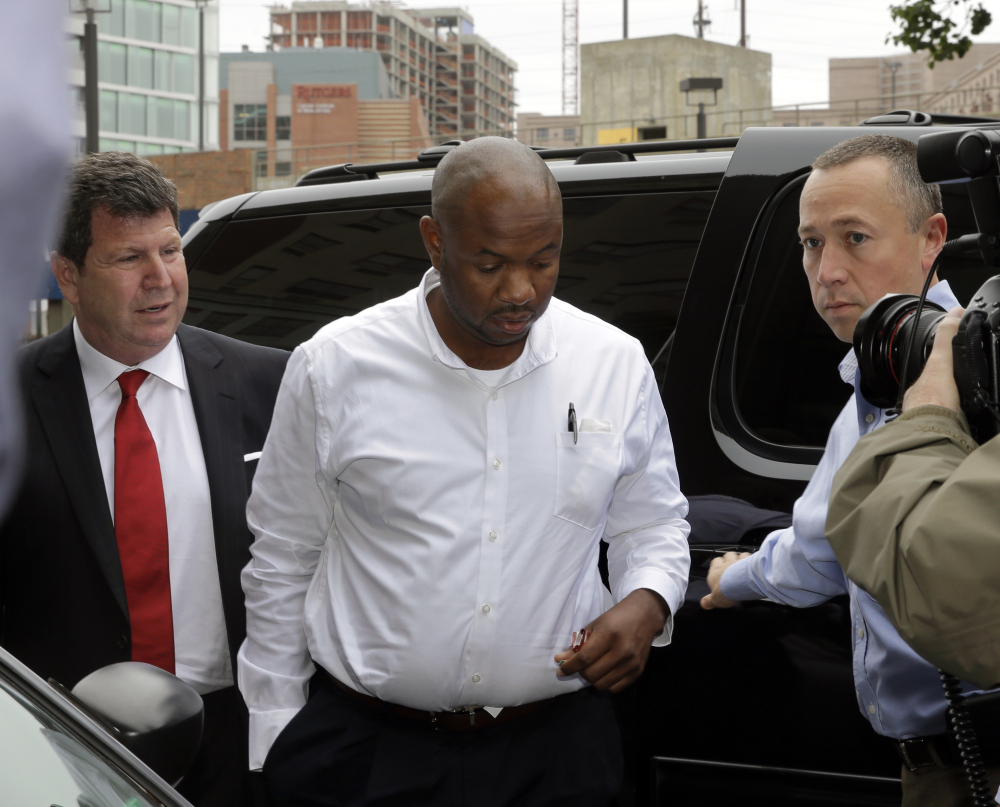 Kevin Roper, center, arrives with his attorney David Jay Glassman, left, for a court appearance Wednesday in New Brunswick, N.J.