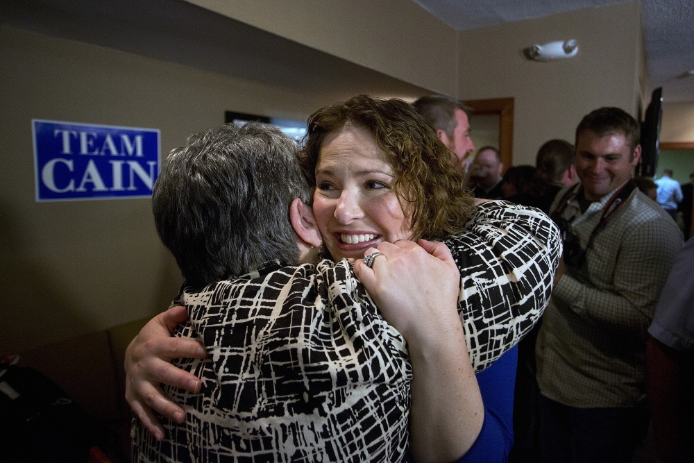 Democrat Emily Cain hugs a supporter at the Holiday Inn in Bangor after she defeated her opponent, Troy Jackson, by a margin of 71-29 percent in the primary election Tuesday.