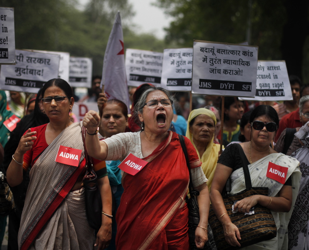 Violence against women has triggered massive protests in India, including the one above on May 31 by the AIDWA group after the gang rape of two teenage girls in New Delhi.