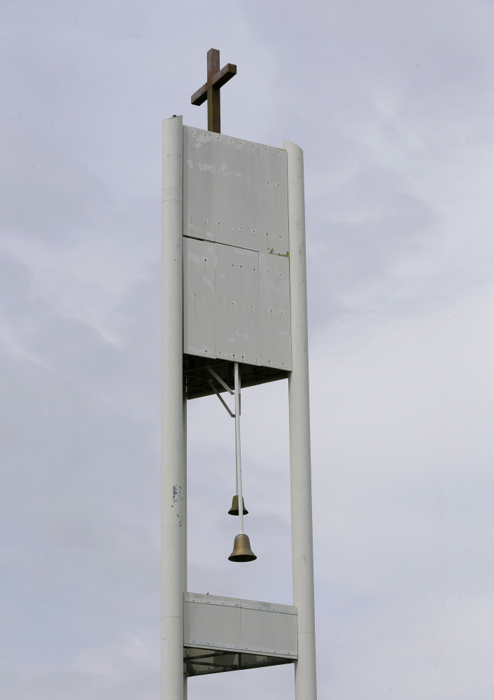 This cellphone tower inside the bell tower is seen over the Resurrection Lutheran Church in Ankeny, Iowa. As wireless companies fill gaps in their networks, many have sought to camouflage the ungainly outdoor equipment that carries the nation’s daily diet of calls, text messages and data.