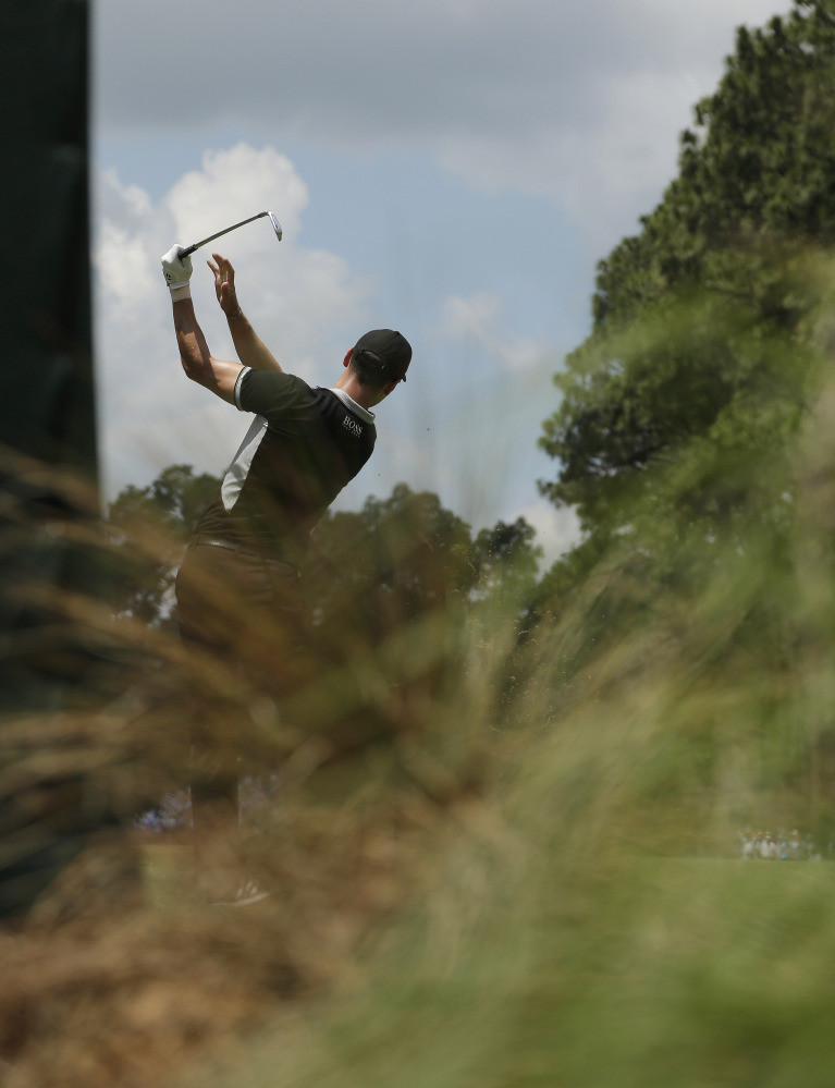 Martin Kaymer, of Germany, watches his tee shot on the sixth hole during the second round of the U.S. Open golf tournament in Pinehurst, N.C., Friday, June 13, 2014.