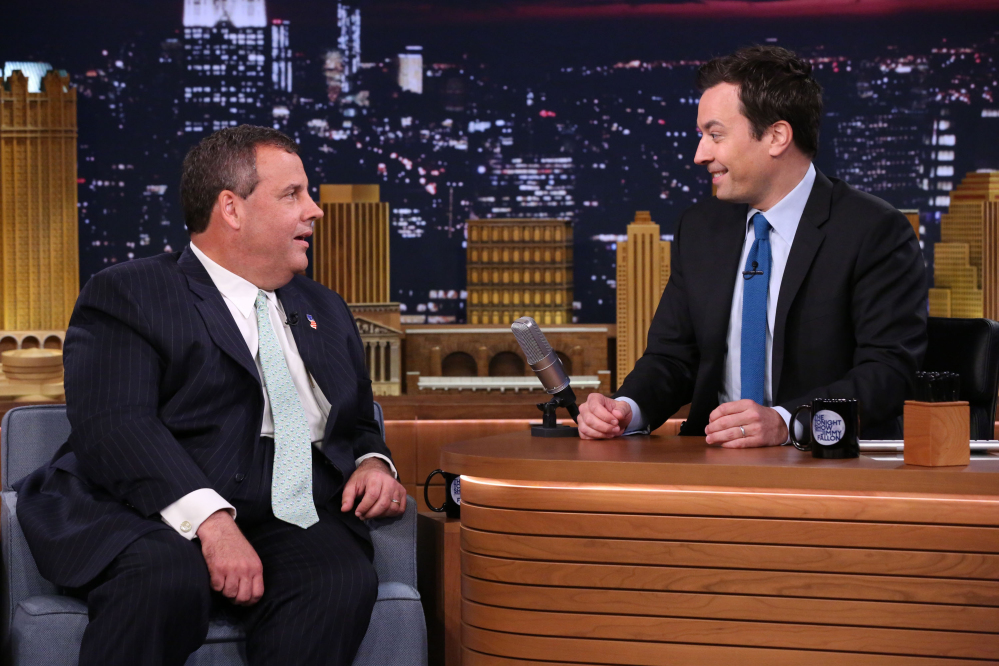 This Thursday, June 12, 2014, photo provided by NBC shows Gov. Chris Christie, left, during an interview on “The Tonight Show Starring Jimmy Fallon.” During his appearance, Christie was asked whether, “hypothetically,” he thinks he could beat Democrat Hillary Clinton in a one-on-one matchup. “Hypothetically? You bet,” he said.