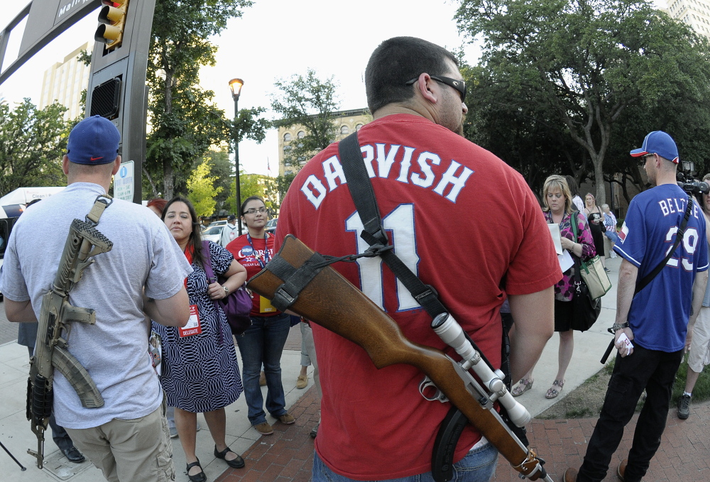 Participants in an Open Carry rally at the Fort Worth Convention Center in Fort Worth, Texas, on June 5 advocate for the right to bear arms in public.