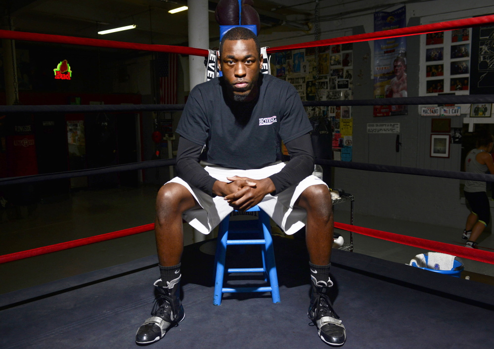 Russell Lamour fights for the New England middleweight title Saturday. He works the graveyard shift at Long Creek Youth Development Center to support his dream of winning a world title.