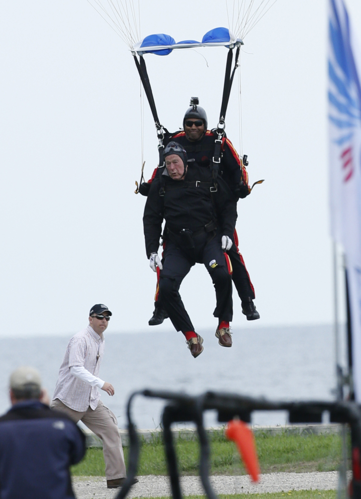 Mike Elliott and former President George H.W. Bush prepare to touch down Thursday in Kennebunkport.