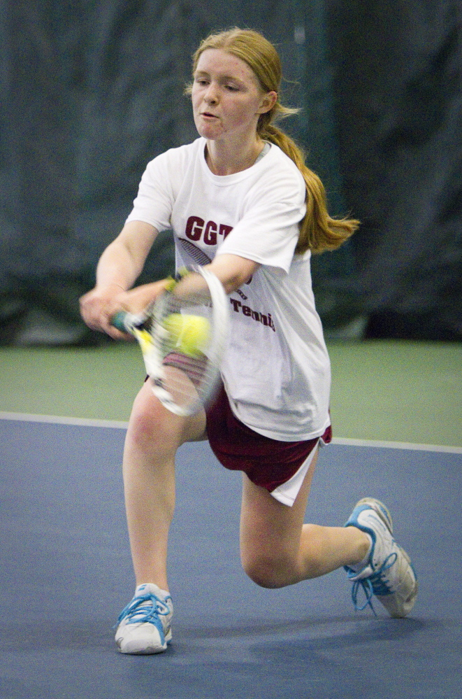 Katherine Pares of Greely returns a shot to Colleen O’Donnell of Camden Hills during their singles match in the Class B state final.