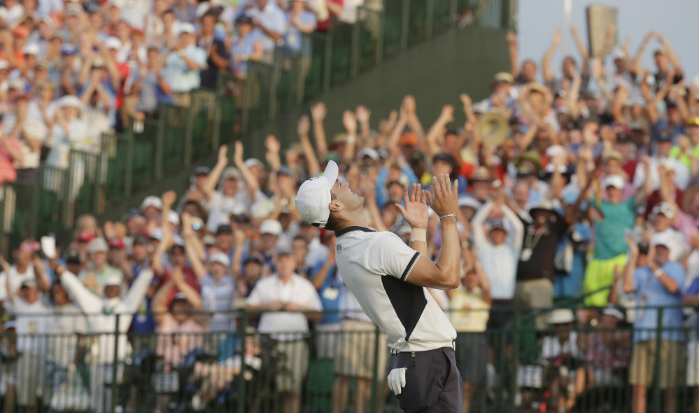 Martin Kaymer, of Germany celebrates after winning the U.S. Open golf tournament in Pinehurst, N.C., Sunday.
