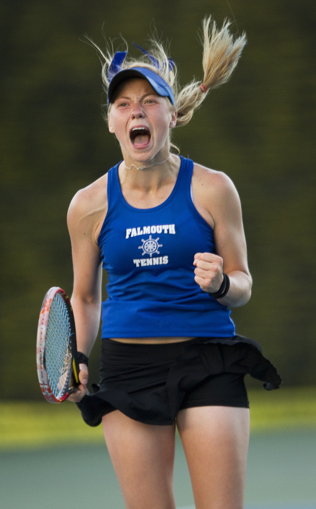 Falmouth’s Olivia Leavitt celebrates after defeating Brunswick’s Masie Silverman during the Class A tennis state championships Monday in Lewiston.