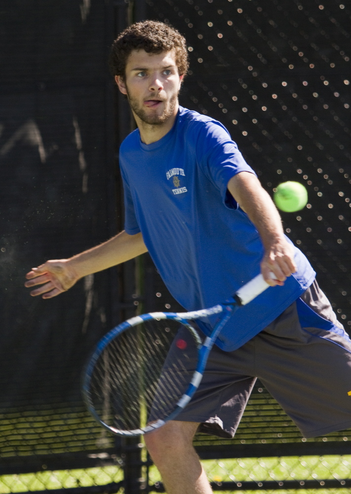 Falmouth’s Ben Aicher returns a Mt. Ararat shot during a doubles match at the Class A tennis state championships at Bates College in Lewiston.