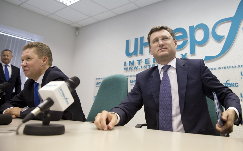 Russia’s Energy Minister Alexander Novak, right, listens as Russian state-run natural gas giant Gazprom CEO Alexei Miller speaks at a news conference in Moscow on Monday. Russia on Monday halted gas supplies to Ukraine as a payment deadline passed.