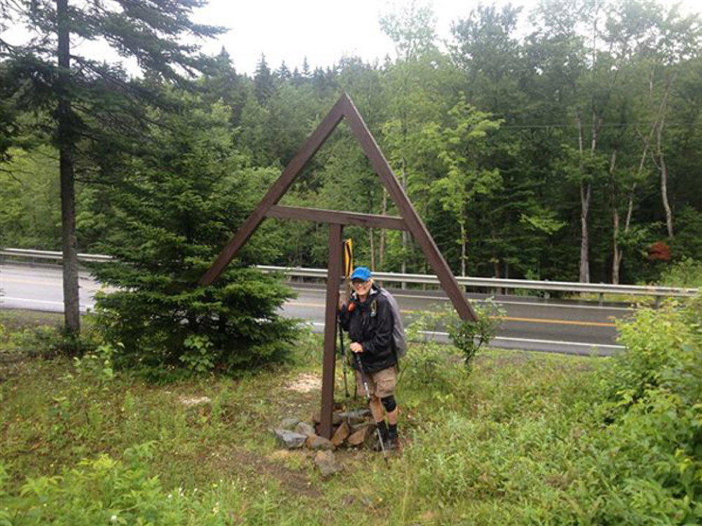 Search: This photo taken Saturday, July 20, 2013, in Sandy River Plantation at the intersection of Route 4 shows Geraldine Largay in the rain jacket that she would likely have been wearing in the rain on Tuesday, July 23.