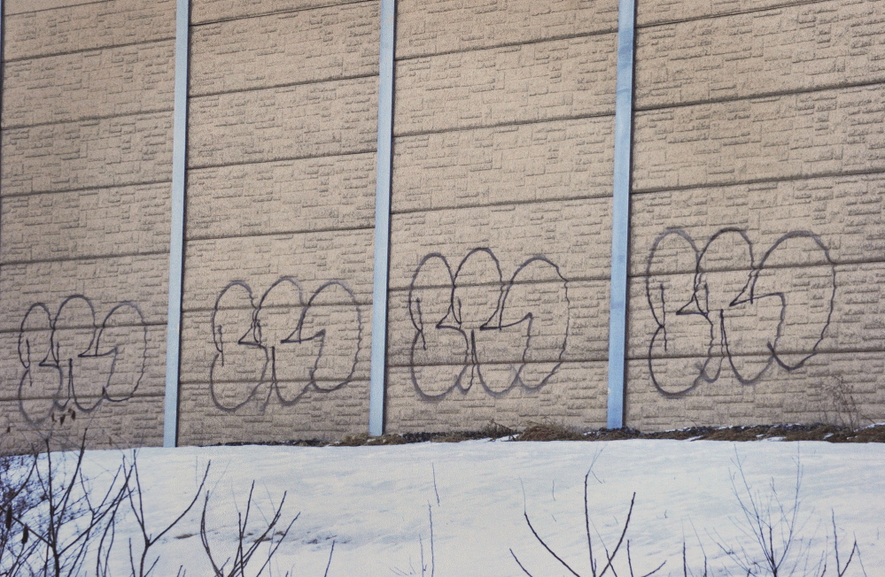 William H. O’Brien of Scarborough has been indicted on charges of aggravated criminal mischief for allegedly painting these symbols on the barrier wall along Route 295 in South Portland.