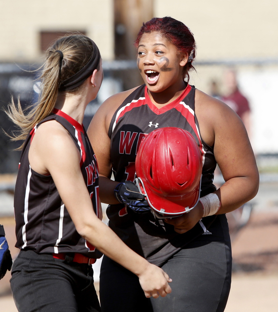 Wells High School’s Jordan Agger celebrates after hitting her third home run against Cape Elizabeth High School during their Western Class B championship softball game at Saint Joseph’s College in Standish on Wednesday.