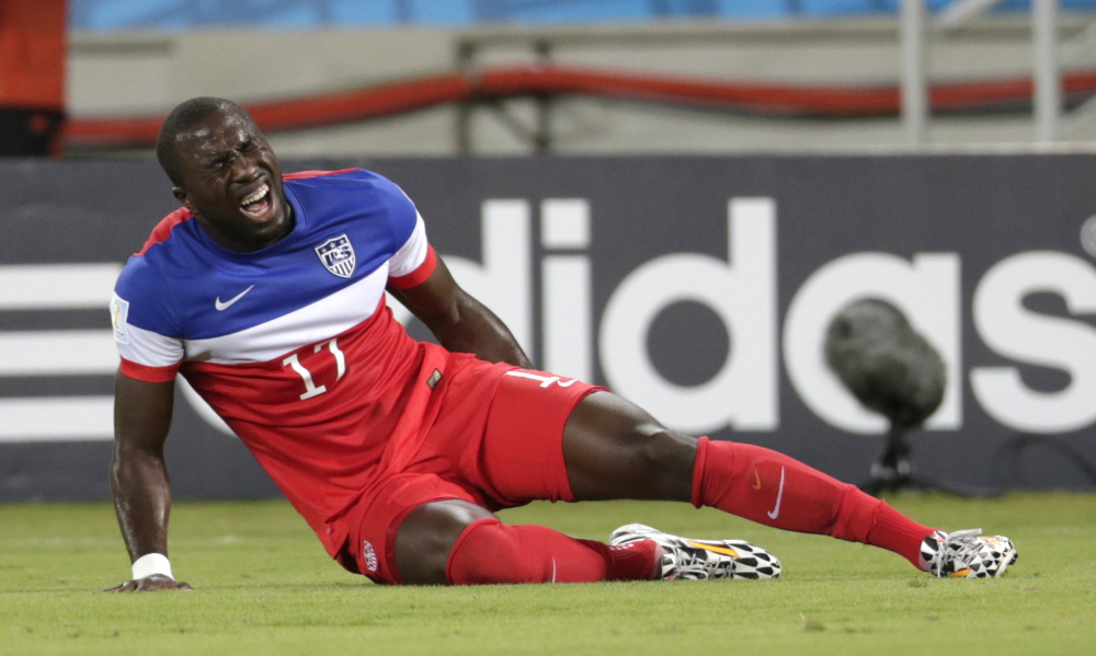United States’ Jozy Altidore grimaces after pulling up injured during the group G World Cup soccer match between Ghana and the United States in Natal, Brazil, Monday, June 16, 2014.