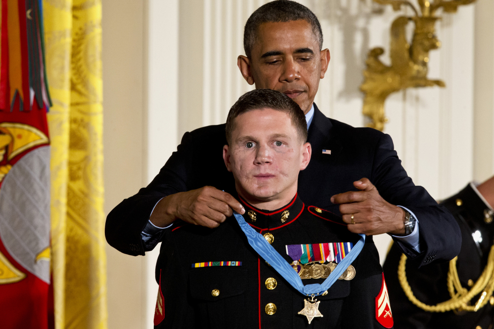 President Obama awards retired Marine Cpl. William “Kyle” Carpenter the Medal of Honor for conspicuous gallantry Thursday in the East Room of the White House.
