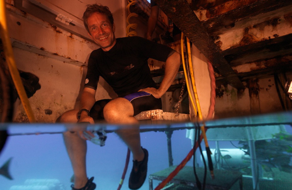 Fabien Cousteau sits inside Aquarius Reef Base in the Florida Keys National Marine Sanctuary in 2012. He plans to document and share via social media 31 days of undersea living and science experiments. The Associated Press