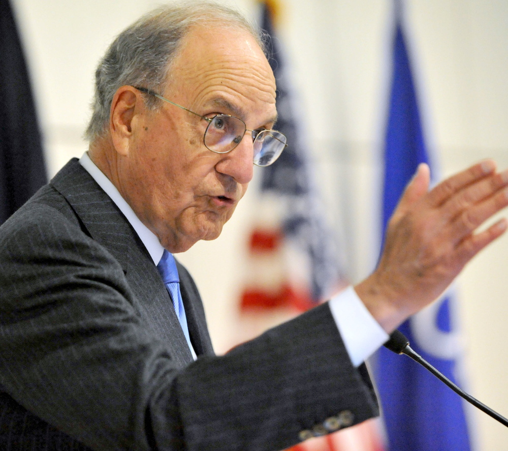 Former U.S. Sen. George Mitchell speaks at Colby College earlier this year. He says college students need mentoring as well as money to complete their degrees.