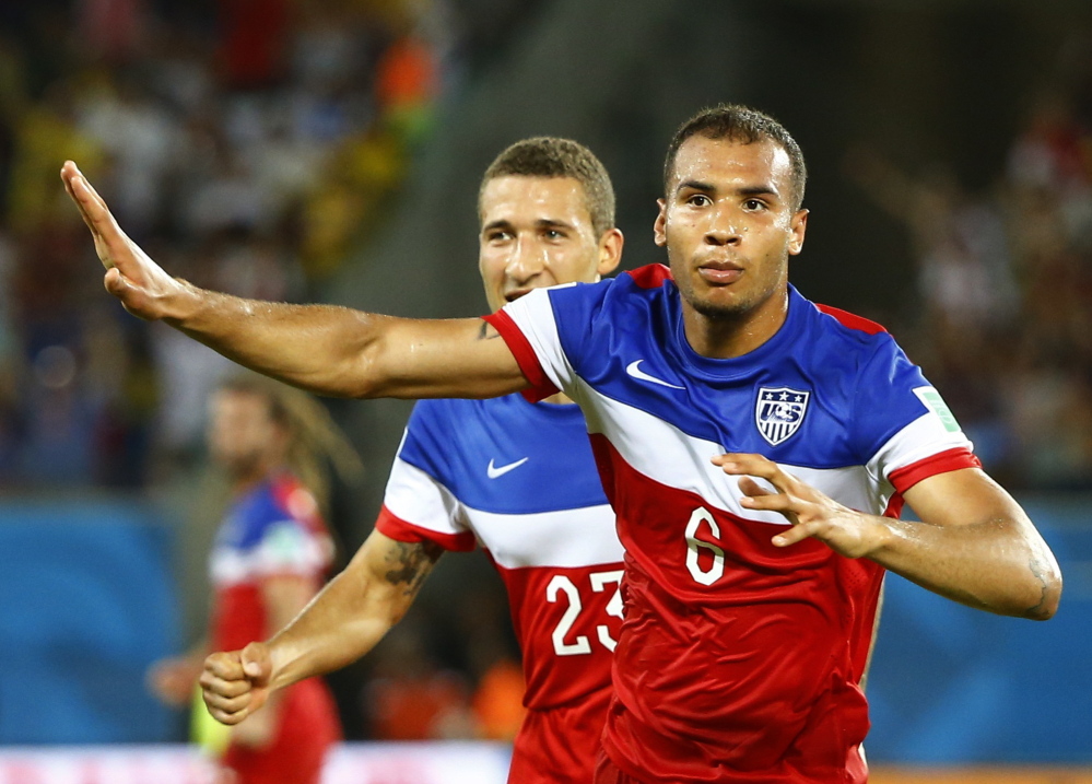John Brooks of the United States celebrates his goal against Ghana with teammate Fabian Johnson last week during their 2014 World Cup Group G game in Natal, Brazil. Nike, which outfits the U.S. team, touts its Dri-FIT technology in its jerseys for improved breathability.