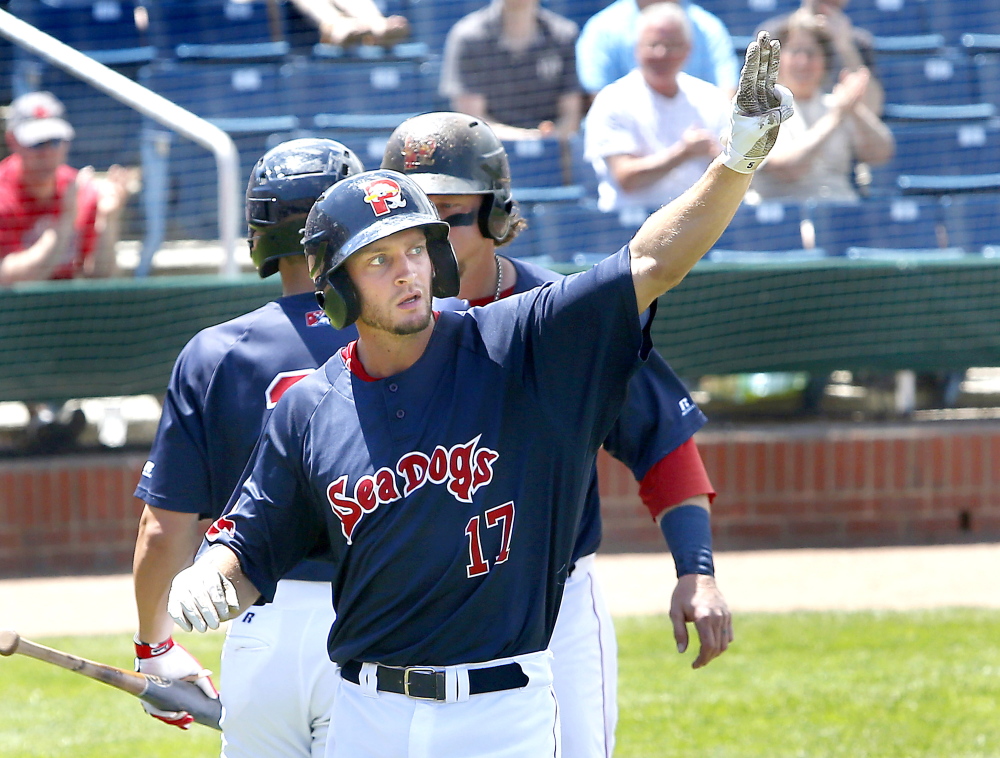 The Sea Dogs’ Jonathan Roof celebrates after hitting a two-run homer in the second that put Portland up 3-0.