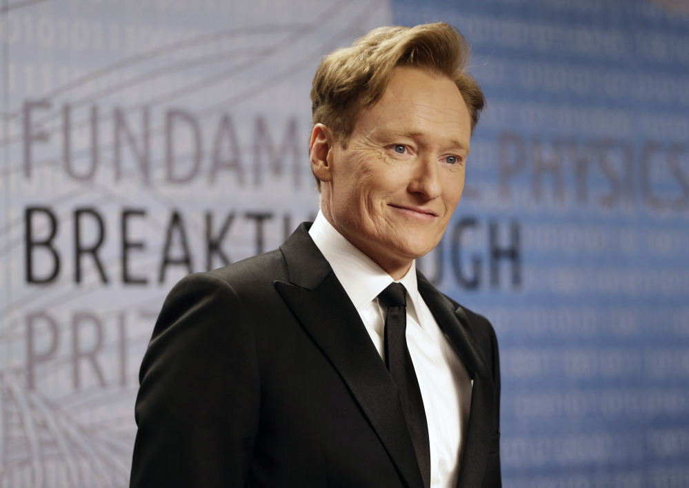 In this Dec. 12, 2013, file photo, talk show host Conan O’Brien arrives for the Breakthrough Prize in Life Sciences awards in Moffett Field, Calif.