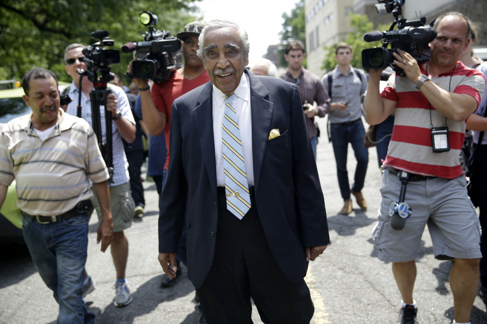 Congressman Charles Rangel is followed by reporters in New York, Monday, June 23, 2014. With Primary Day just a day away, longtime congressman Rangel says he’s not overconfident he’ll prevail over his closet rival — but insisted that voters would stick with a veteran lawmaker, dismissing criticism that he was too old to continue serving in Washington.