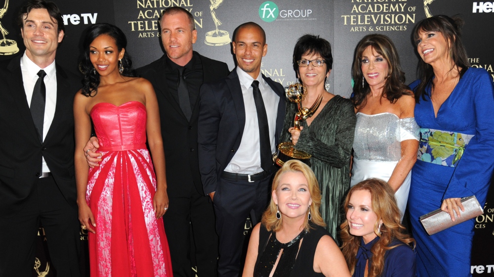 The cast and crew of “The Young and the Restless” pose with the award for outstanding drama series at the 41st Daytime Emmy Awards on Sunday in Beverly Hills, Calif.