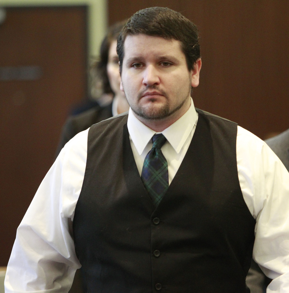 Seth Mazzaglia, who is charged with first-degree murder in the 2012 death of Elizabeth “Lizzi” Marriott, is escorted out of the courtroom in this June 4, 2014, photo.