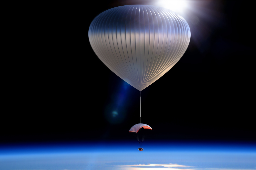 This artist rendering shows the World View Voyager pressurized space capsule that will be transported to the edge of space. World View Enterprises of Tucson, Ariz., is planning to begin its $75,000 per-person flights in 2016. The balloons will lift a capsule carrying six passengers and two crew members 20 miles up, where they will float under a parafoil for about two hours before floating back down to Earth.