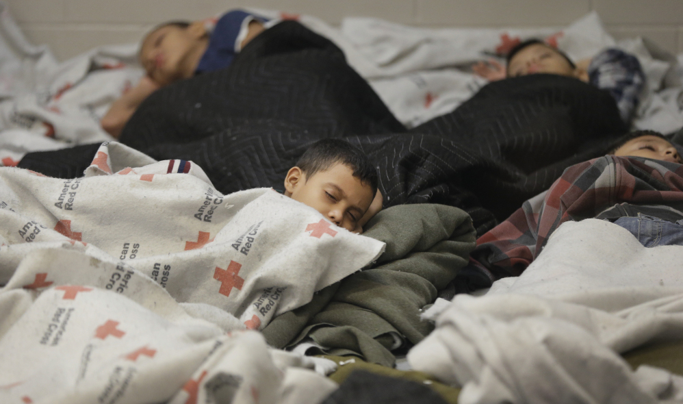 Children detainees sleep in a holding cell last week at a U.S. Customs and Border Protection processing facility in Brownsville, Texas.