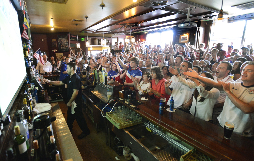 It was standing room only as patrons at Ri Ra's watch the United States play Germany during the World Cup match in Brazil.