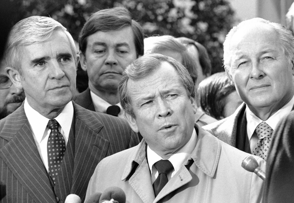 This 1982 photo shows Senate Majority Leader Howard Baker of Tennessee flanked by Sen. Paul Laxalt, R-Nev., left, and House Minority Leader Robert Michel of Illinois.