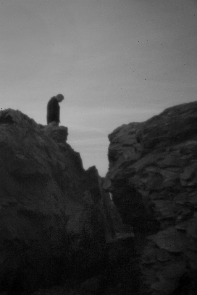 A member of the tribe, Allen Sockabasin, as seen through the aperture of a pinhole camera, stands on Split Rock at the Pleasant Point Indian Reservation on April 30. Split Rock is of great spiritual significance to the Passamaquoddy, a tribe with two reservations in Washington County, Maine. Read more about the camera, PAGE AX