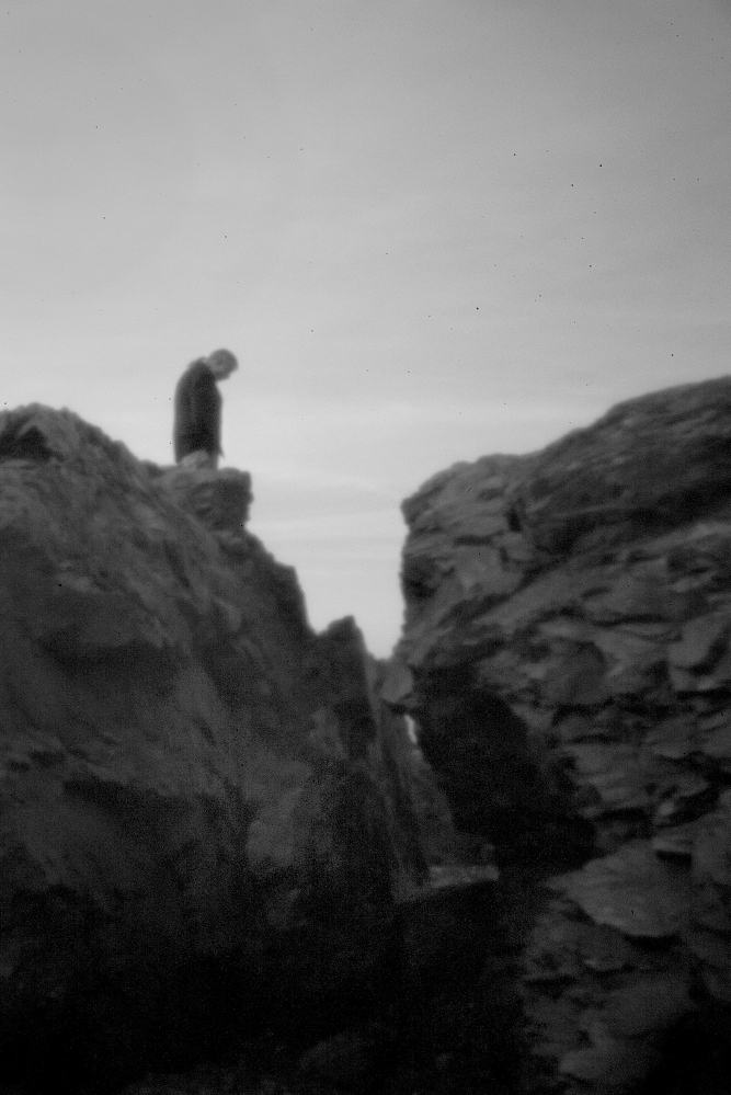 Allen Sockabasin, a member of the tribe seen through the aperture of a pinhole camera, stands on Split Rock at the Pleasant Point Indian Reservation on April 30. Split Rock is of great spiritual significance to the Passamaquoddy, a tribe with two reservations in Washington County, Maine. Read more about the pinhole technique, PAGE A12