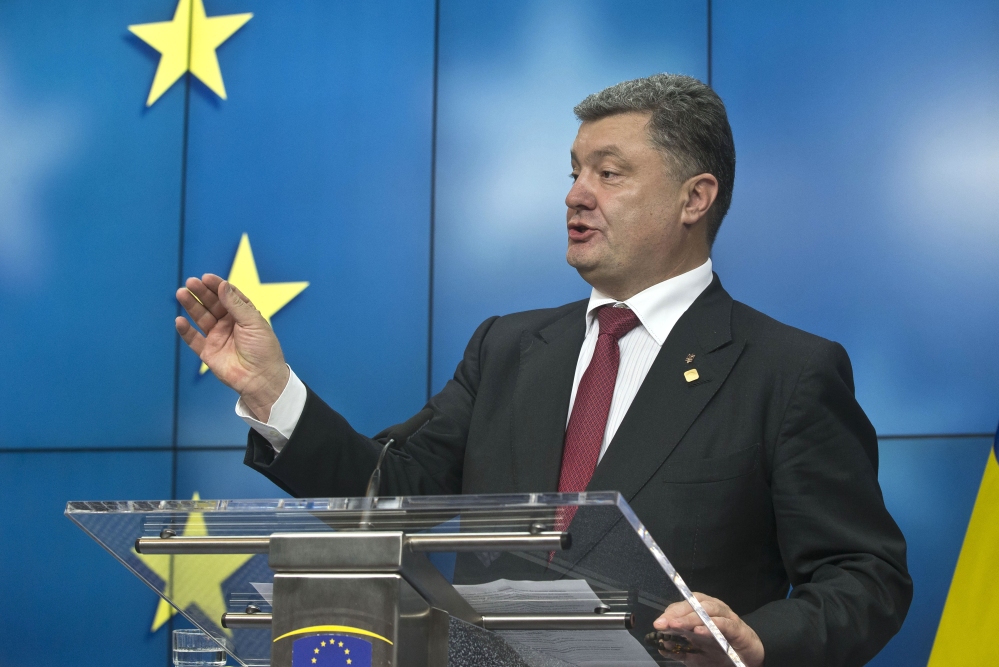 Ukrainian President Petro Poroshenko speaks during a news conference after a signing ceremony at an EU summit in Brussels on Friday.