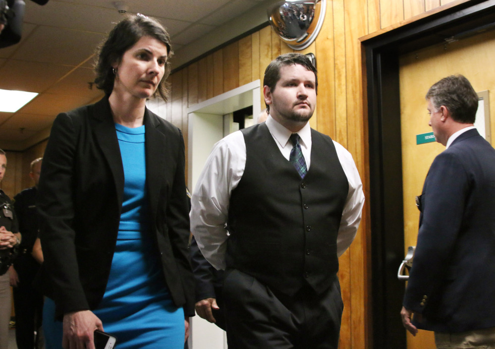 Defendent Seth Mazzaglia enters the courtroom with defense attorney Melissa Davis on Friday in Strafford County Superior Court in Dover, N.H.