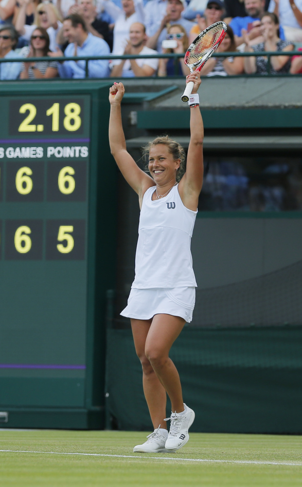 Barbora Zahlavova Strycova of the Czech Republic celebrates winning against Li Na of China in their women’s singles match at the All England Lawn Tennis Championships in Wimbledon, London, Friday  June  27, 2014.