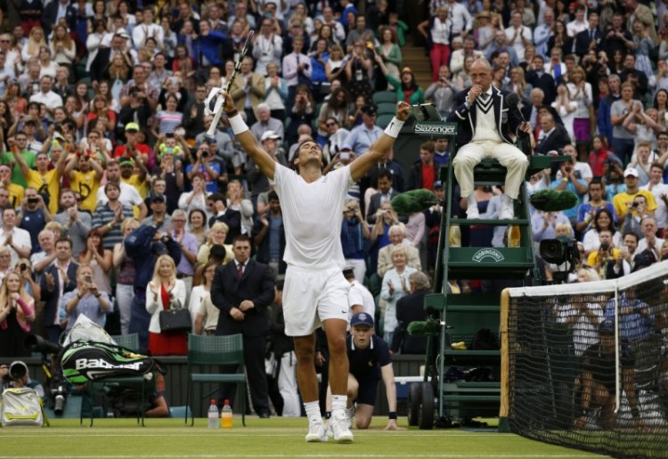 Rafael Nadal of Spain celebrates after defeating Mikhail Kukushkin of Kazakhstan in their men’s singles match at the All England Lawn Tennis Championships in Wimbledon, London on Saturday.
