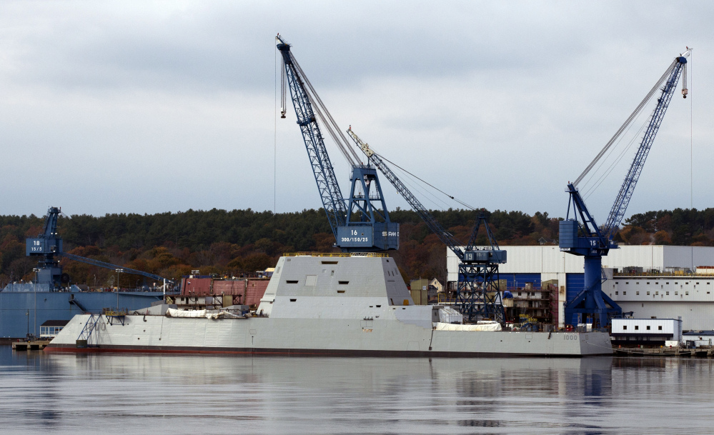 In this October 2013 photo, the Navy’s stealthy Zumwalt destroyer is anchored at Bath Iron Works in Bath. Shipbuilders plan to bring military-grade jet fuel aboard the Navy’s biggest destroyer in July, in preparation for lighting off some of the world’s largest marine turbines for the first time.