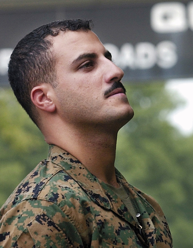 USMC Cpl. Wassef Ali Hassoun is seen in 2004, waiting to make a statement to media outside the Marine base at Quantico, Va.