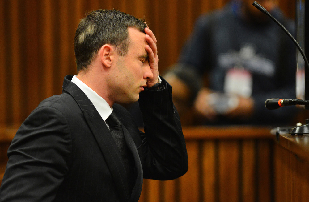 Oscar Pistorius listens to evidence in court in Pretoria, South Africa. Judge Thokozile Masipa began hearing testimony Monday before deciding what sentence the double-amputee Olympic athlete should serve.