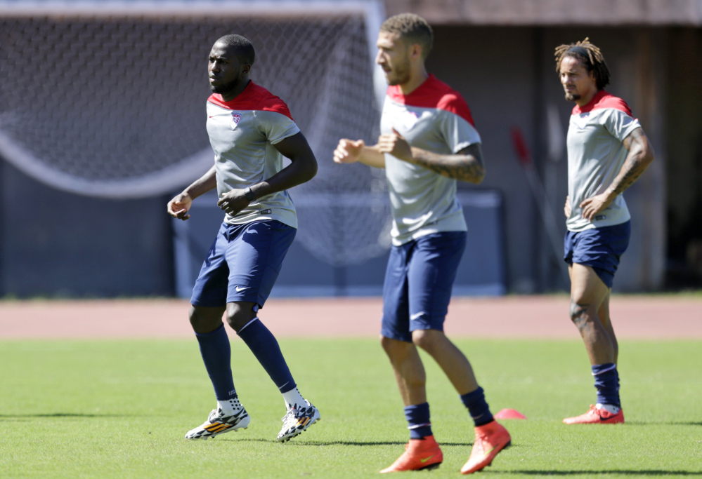 United States’ Jozy Altidore, left, Fabian Johnson, center, and Jermaine Jones work out during a training session in Salvador, Brazil, Monday, June 30, 2014.