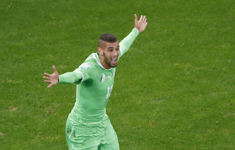 Algeria’s Islam Slimani reacts after his goal was disallowed during the World Cup round of 16 soccer match.