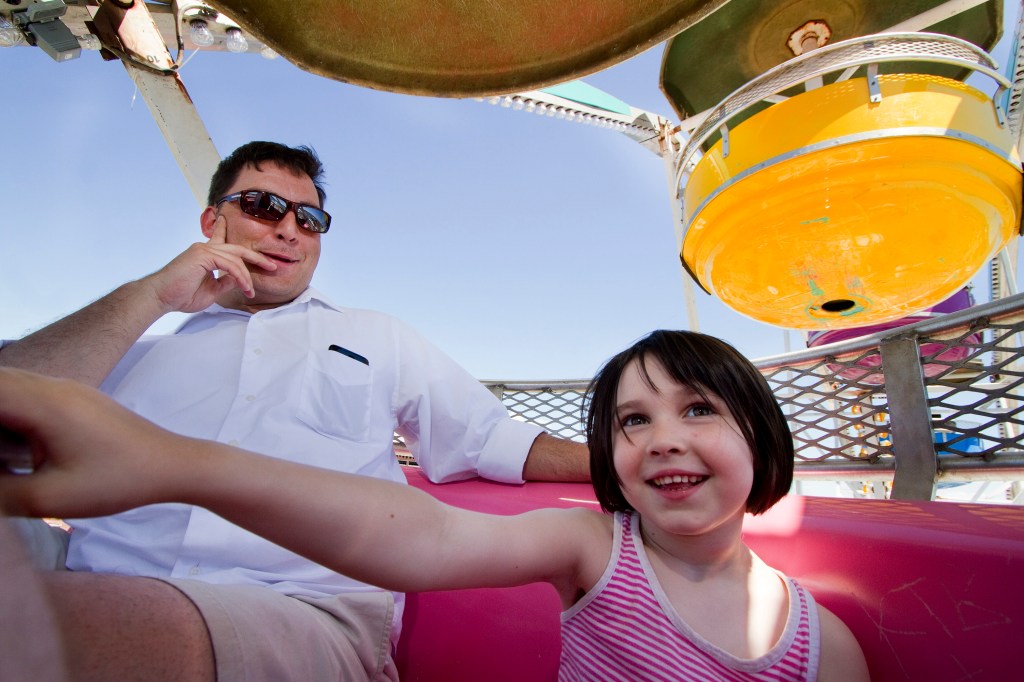 Tony Hanson and his daughter Amelia Hanson, 5 of Westbrook, ride the Ferris wheel near Commercial Street during the 2014 Old Port Festival in Portland on Saturday, June 7, 2014. Carl D. Walsh/Staff Photographer