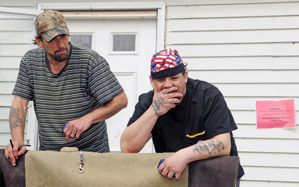 Tyson Joseph Goldstein, left, and Brett Hollowell Sr., say they plan to stay at Meadowbrook Trailer Park now that improvements are in the works. Joe Phelan/Kennebec Journal
