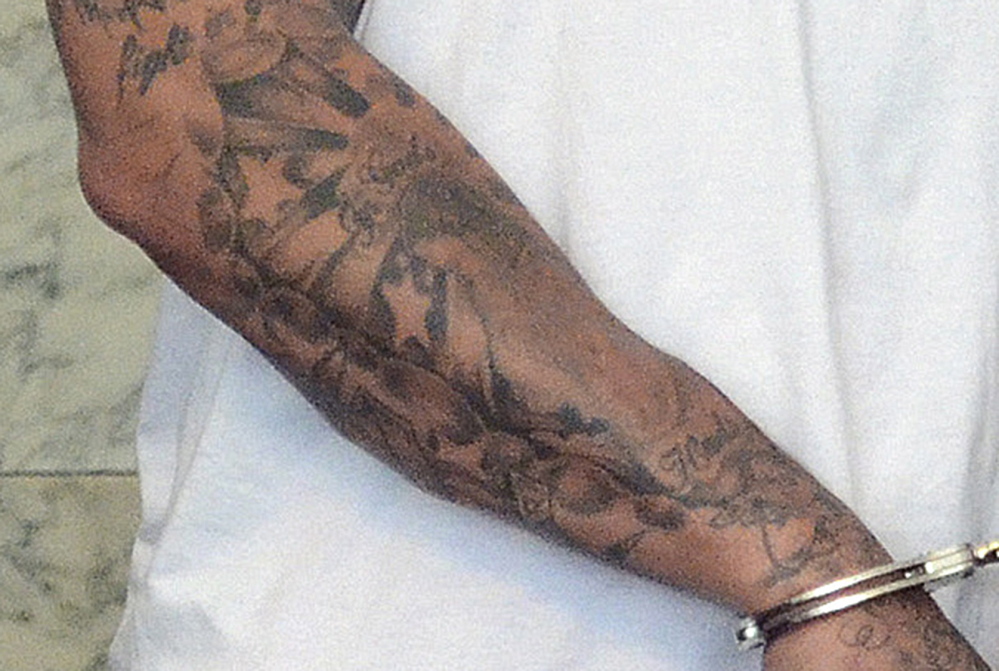 The Associated Press A detail of a June 26, 2013, photo, shows some of the five stars tattooed on the right forearm of former New England Patriots tight end Aaron Hernandez. While many star tattoos have nothing to do with crime, they can sometimes be used to represent killings.