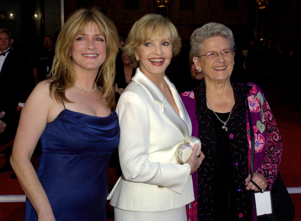 Florence Henderson, center, is flanked by fellow cast members of âThe Brady Bunchâ television show Susan Olsen, left, and Ann B. Davis as they arrive to ABCâs 50th Anniversary Celebration Sunday, March 16, 2003, at the Pantages theater in Los Angeles. The Associated Press